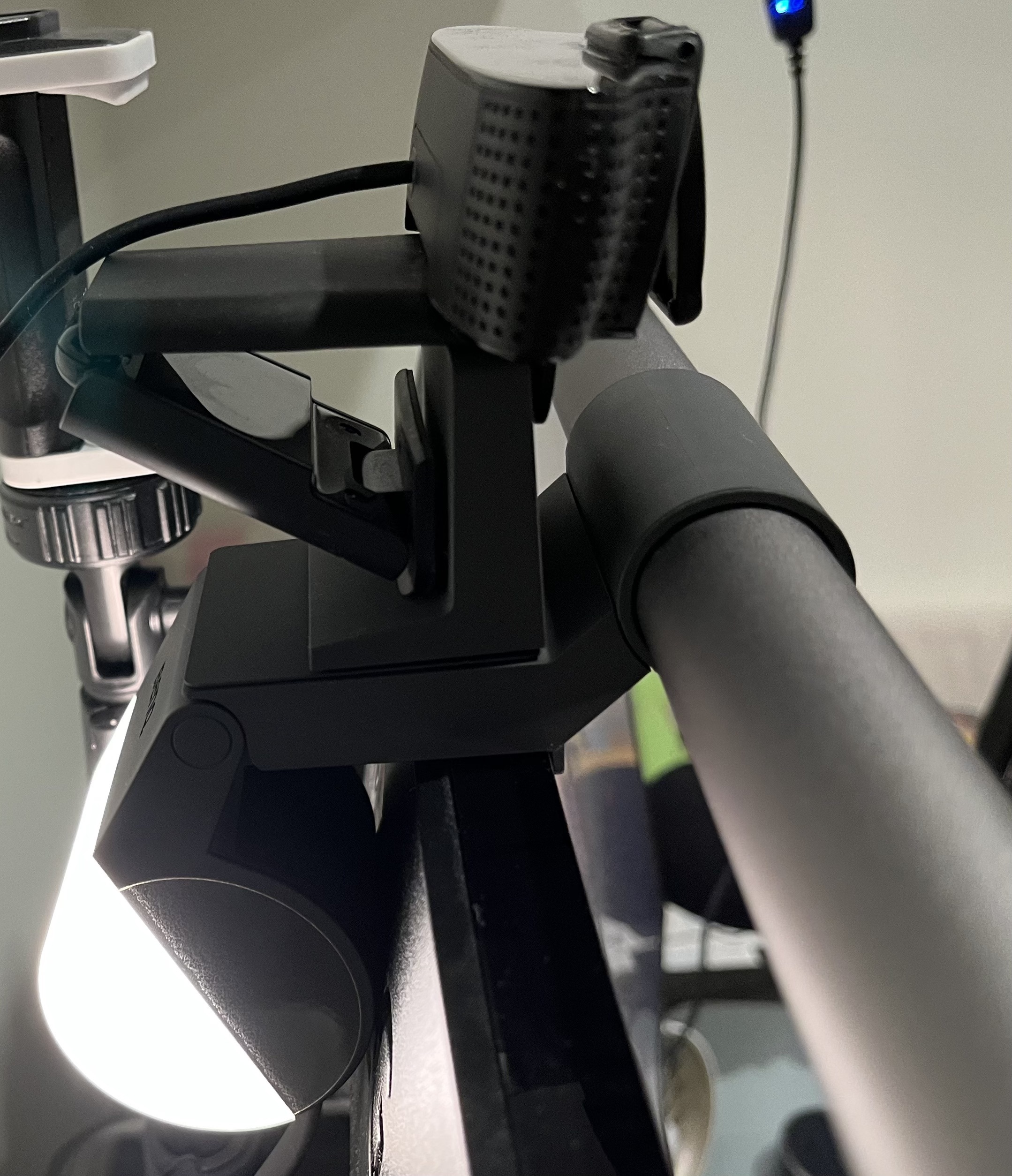 Side view behind my monitor of with my webcam on top of the Halo using the webcam accessory